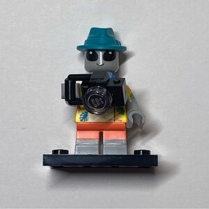 Blue and Orange Simulated Camera Figurine with Black Camera